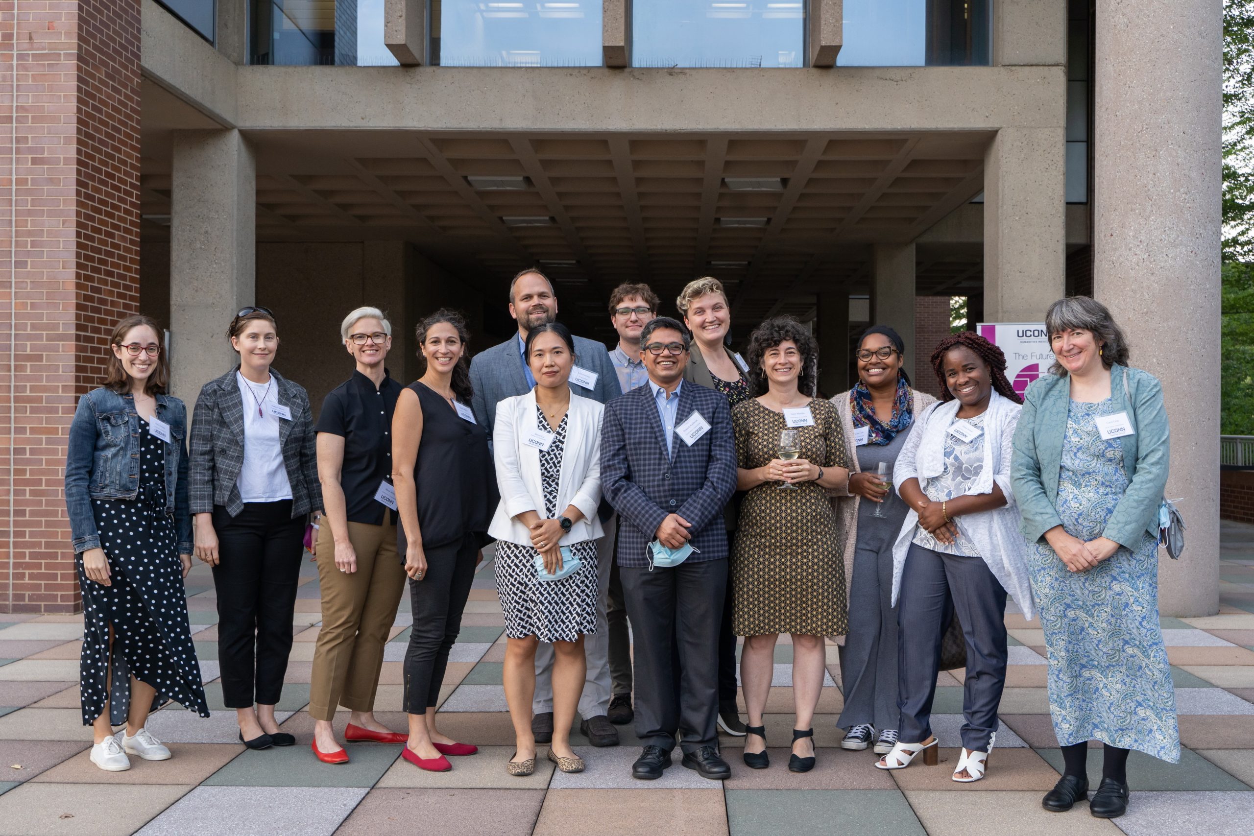 The 2021–2022 UCHI fellows stand in a group at the welcome reception.